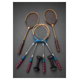 Six Racquets and Two Dumbbells