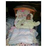 Dolls in Cradle