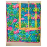 Quilted flamingo table rug