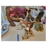 Collection of eagle figurines