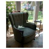 Green wooden framed chair