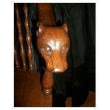 Head on arm of chair