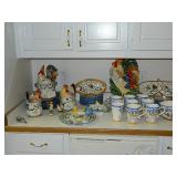 a complete set of Fitz and Floyd China with cannisters and other items