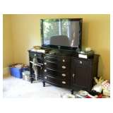 This is buffet that matches dining room furniture, and another flat screen tv