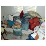 pillows, reds, blues, beige