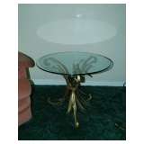One Of Two Glass Top Tables With Brass Leaf Design Feet