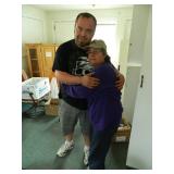 Bo, one of the crew, with Patti the owner
