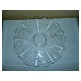 One of two torte plates one with etching one without