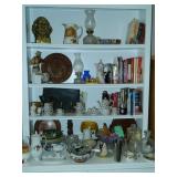 more shelves of fine glass and books