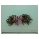 Colorful floral over inside of front door to welcome visitors