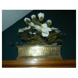 another tin basket holding magnolia blossoms