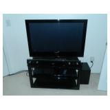 Color tv, stand, dvd player