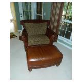 Haverty top grain leather oversize chair with reversible cushions and ottoman