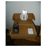 vintage cell phone with charger and book