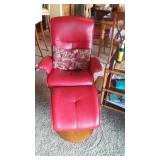 red leather chair and ottoman