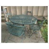 Wrounght iron table w/ 4 chairs