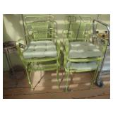 Wought iron patio chairs with green paint