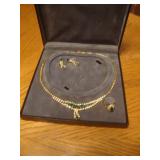 Necklace, earrings, and ring