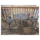 One of 2 sets of cast aluminum garden table with 2 chairs