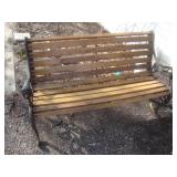 Park bench with lion-head arms