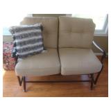 Glider w tan cushions
