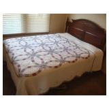 Queen bed with cherry headboard