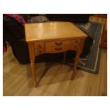 Sewing machine cabinet