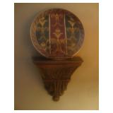 Plate on sconce