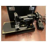 Singer feather weight sewing machine, model 221