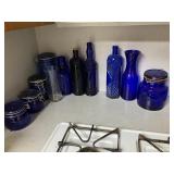 Cobalt glass canister set, vases