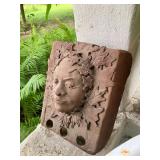 Pottery face birdhouse