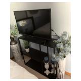 48" flat screen TV, black shelf