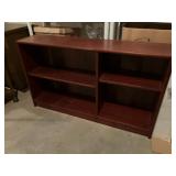 Low, wide shelf with adjustable shelves