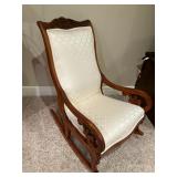 Antique rocker w white upholstery