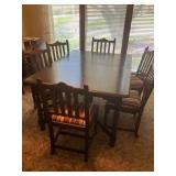 Antique dining table w 4 leaves and 6 chairs