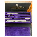 Antique drafting set