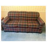 Hide-a-bed sofa w plaid upholstery