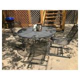Wrought iron table w 4 rocker chairs