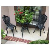 Cast aluminum table w 2 chairs