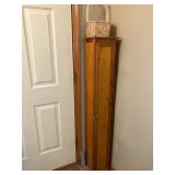 Tall narrow pine cabinet
