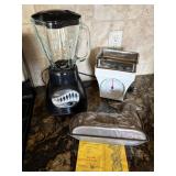 Oster 12-speed blender, Gourmet Weigh kitchen scales, Nordic Ware 3D lamb cake mold