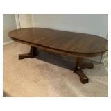 Solid oak table w split pedestal & two 24" leaves, 93" total length