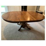 Solid oak table w one 24" leaf