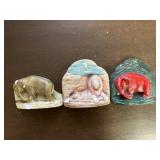 Cast plaster elephants
