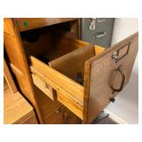 Drawer on oak file cabinet