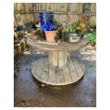 Large wooden spool table