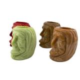 Lot 544  Greentown Glass Witch Head Toothpick Holders Four (4) Slag