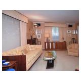 Tons of Mid Century Modern Furniture Throughout 