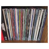 Tons of Albums and Laser Disks 