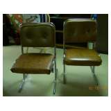 4 chrome-frame chairs